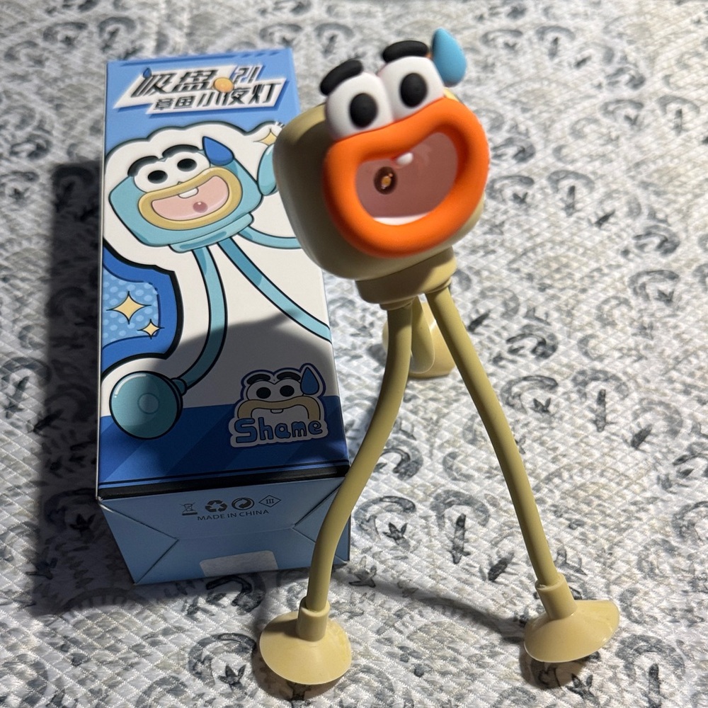 Nightlight-Playful Action Figure with suction cup feet - New in Box!